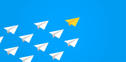 Fototapeta premium One yellow paper plane leading a group of white planes, symbolizing leadership, innovation, and setting the path forward