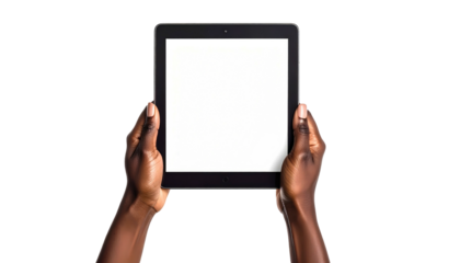 Hands holding a tablet with a white screen against a plain black background