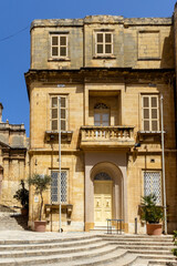 Fototapeta premium Old, typical limestone tenement house in Malta