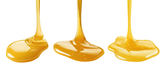 Three streams of golden liquid pouring and pooling