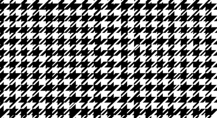 A classic black and white houndstooth pattern, a timeless textile design.