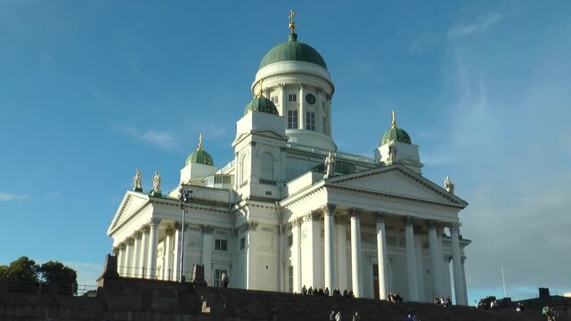 HELSINKI, FINLAND - July 12, 2016: the Cathedral of St. Nicholas on the background blue sky on a summer evening, timelapse.