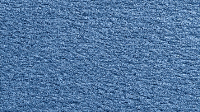 Blue textured paper surface with subtle ripples and linear patterns