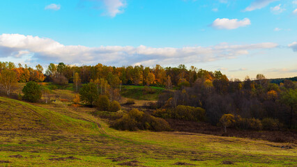 Fototapeta premium picturesque autumn landscape in the sunset light - panorama