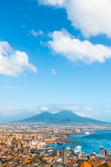 Fototapeta premium Panoramic view of Naples city and Gulf of Naples, Italy. Vesuvius volcano in the background.
