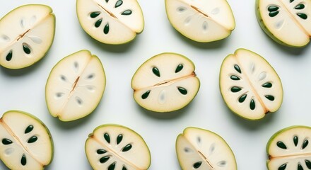 Obraz premium Exotic Soursop Slices Arranged in a Pattern Demonstrating Nature's Culinary Delights