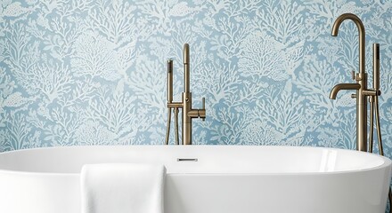 A luxurious bathroom featuring a white bathtub with elegant gold faucets and a beautiful blue floral wallpaper backdrop