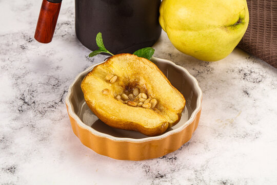 Baked quince with honey and cedar