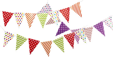 A carnival garland with multicolored flags on a white background. Decorative colorful pennants for birthday and New Year's celebrations.