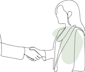 Two people shaking hands in agreement handshake business