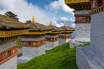 DOCHULA, BHUTAN, OCtober 4, 2025 : On a mountain pass in the Himalayas on the road from Thimphu to Punakha, 108 memorial stupas known as Druk Wangyal Chortens have been built