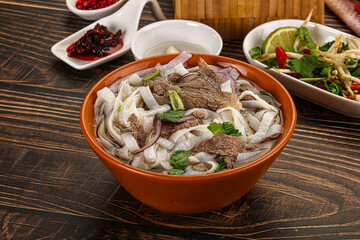 Vietnamese Pho Bo soup with beef and noodles