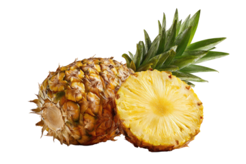 Two pineapples, one whole and one sliced, vibrant yellow flesh, green leaves