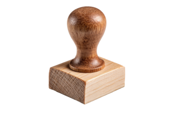 Close-up of a wooden stamp.  A light-colored wooden stamp with a light-brown wooden handle