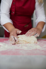Making a cake with white and pink chocolate strawberries. High quality photo