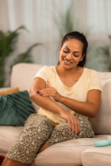 Woman Applying Moisturize On Hands