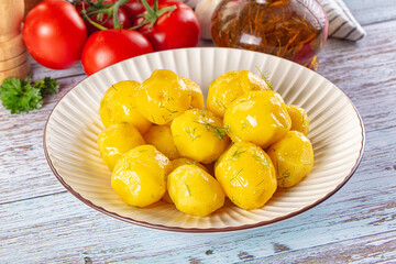 Boiled young potato with oil