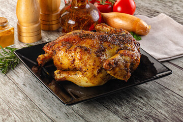 Baked in oven whole chicken with spices