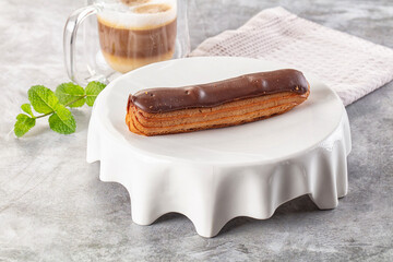 Gourmet chocolate eclair with icing