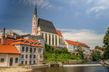Fototapeta premium St. Vitus Church and Riverside Architecture in Český Krumlov, Czech Republic