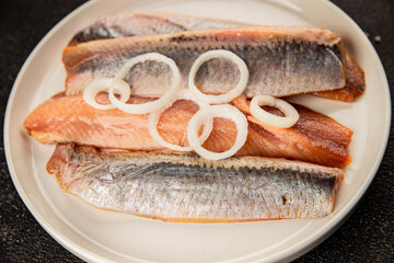 Herring fillet fish fresh seafood portion size natural product tasty snack fresh delicious gourmet food background on the table rustic top view copy space pescetarian diet