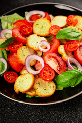 Panzanella salad tomato, croutons, onions vegetables dish natural product tasty snack fresh delicious gourmet food background on the table rustic top view copy space
