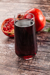 Sweet fresh pomegranate juice glass