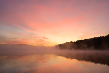 As the sun begins to rise over Glen-O-Jones Lake, a breathtaking beauty unfolds in all directions. The warm glow of the morning light dances across the surface of the water, casting shimmering reflect