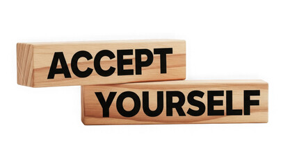 Wooden blocks spell out accept yourself message