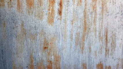 Rusty metal surface with orange and gray patterns