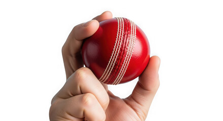 Hand gripping a red cricket ball with seam detail