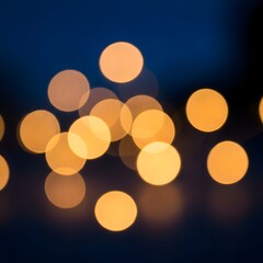Soft glowing golden bokeh lights creating a magical and dreamy abstract background effect