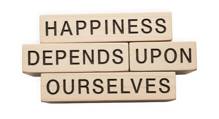 Happiness depends upon ourselves message on letter tiles