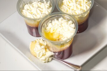 a delicious strawberry trifle in a plastic jar