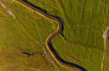 Peaceful autumn landscape in the Republic of Moldova with colorful forests, golden trees, and gentle sunlight