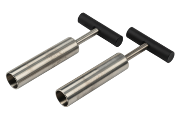 Professional stainless steel coring tools ready for precision food preparation in a commercial kitchen environment, culinary expertise.