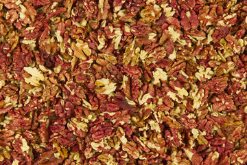 Red kernels of shelled walnuts dried after the autumn harvest 