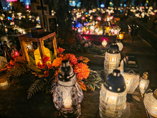 Traditional Polish cemetery on All Saints&rsquo; Day, glowing with countless candles at night. A moving cultural and spiritual tradition captured in vivid light and color.