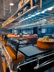 Close-up of Delicious Tarts with Cream and Berries.