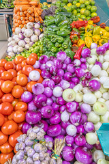 Colorful display of fresh vegetables at the Otavalo market, one of the largest and most traditional markets in Ecuador.