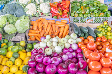 Colorful display of fresh vegetables at the Otavalo market, one of the largest and most traditional markets in Ecuador.