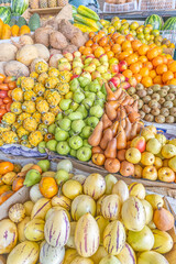 Colorful display of fresh fruits at the Otavalo market, Ecuador. A vibrant scene that conveys freshness, abundance, and natural flavor.