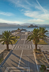 Scenic Seafront Promenade in Nafplio, Greece at Sunset