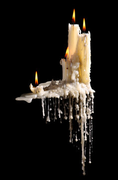 burning candles on a dark background
