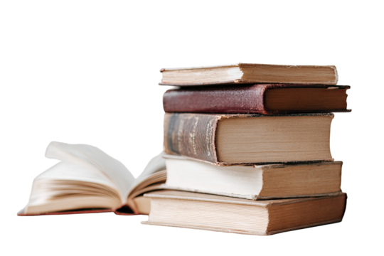 Stacked vintage books, one open