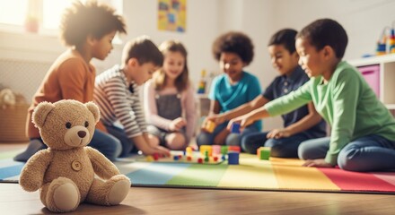 Group of diverse children playing with building blocks on colorful mat indoors. concept of childhood fun, learning, social interaction, creative playtime