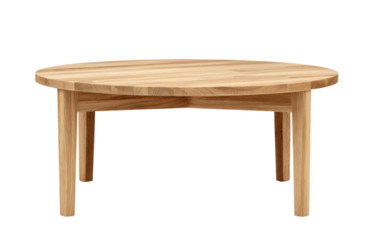 Light brown wooden round coffee table. Simple, round tabletop with four tapered legs