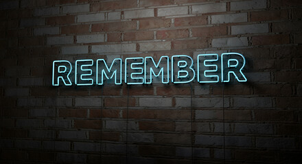 Neon sign with the word remember glowing on a brick wall