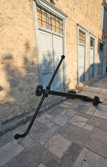 Historic stone building with blue shutters in Nafplio, Peloponnese, Greece
