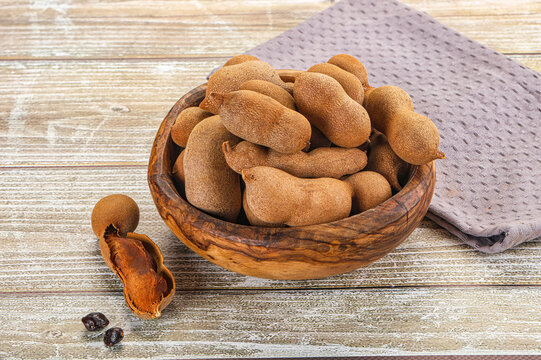 Tropical exotic Tamarind fruit heap